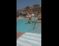 man countdown pics phone on pool chair