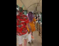 Man with green v shaped mohawk subway