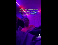 Guy purple light room wakes up