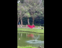 Daughter wave long dress woman pond fountain