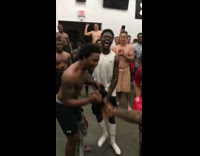 Red shirt black helmet boxing locker room football