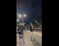 Collab IITW - Man dances with baguette at train station