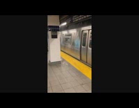 water falling into entrance of subway cars