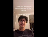 Guy  glasses black shirt sings herpes song for roommate