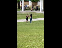 Woman bodysuit top park dance video shoot