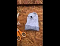 Chicken wears sock ski mask