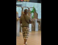 Guy girl with snakes enter train station 