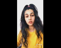 Yellow shirt girl lip syncs files nails 