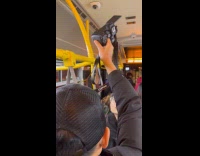 Woman with glasses photoshoot inside the bus