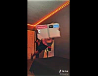 Guy jumps on bed with book 