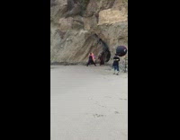 2 Star Wars characters poses with lightsabers for beach photoshoot 