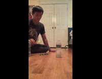 Guy bottle flip and stack dices cup