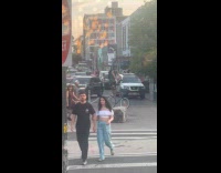 Man on tall bike weird random costume parade