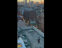 Guy riding segway unicycle on roof