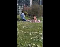 Woman black tube bra bikini picnic public park