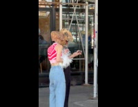 Collab WINY - Couple wear dinosaur mask printed shirts outside coffee shop