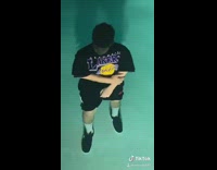 Lakers shirt guy in pool clothes on