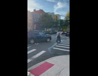 Biker blocks driver path and counts down as he is blocking