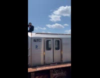 People on the train roof that moves