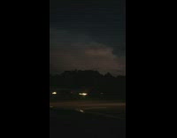 Lightning bolt in sky white cloud car 