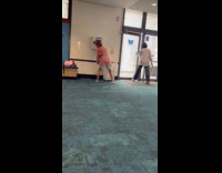 Woman weird dance at the aquarium entrance