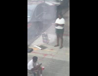 Lit grill produce smoke on the street