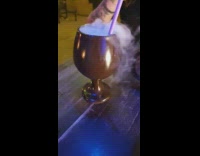 Cocktail drink dry ice gold goblet cup 