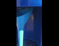 Guy puts together water fountain filler for his tank