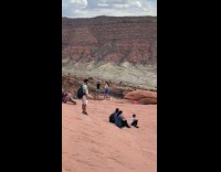 Collab IITW - Two women black and white top tiktok dance on the canyon near the arch