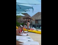 Woman bikini with flower crown beach photoshoot