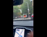 Collab WINY - Large pumpkins inside truck on the sidewalk