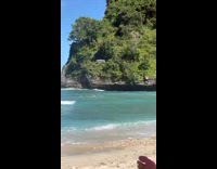 Woman bikini run at beach with drone