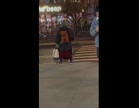 Woman walks pet ferret 