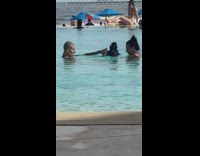 Collab IITW - Bald woman hand on lens underwater camera 