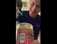 Guy uses hand mixer peanut butter jar 