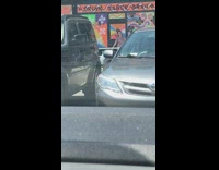 girl hand up storefront mural