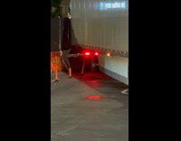 Big truck makes wide turn hitting cones 