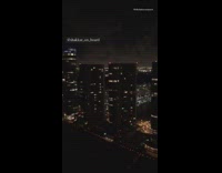 Pilot flies airplane over miami at night 