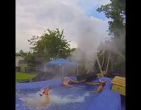 Guy goes down slide friend jumps ATV