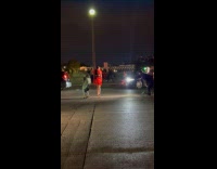 Lady Take Pictures on Middle of Road