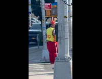 Clown juggling pins while crossing