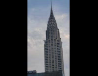 Collab WINY - Man red shirt sit on scaffolding bars