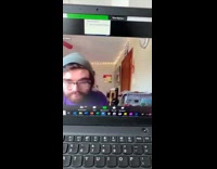 Guy pet mouse on shoulders zoom meeting 