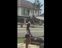 Girl black bikini pool guy carry baby