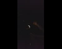 Guy plays the piano in the dark 