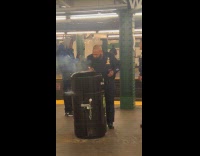 Policeman Peeks Inside Trash Can with Smoke