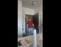 Guy comes into apartment with lipstick marks on face