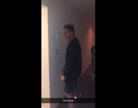 Guy head butts dry wall and makes two dents in wall