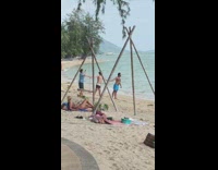 three guys hold hands beach picture