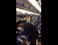 man does back flip on blue hand rails subway
